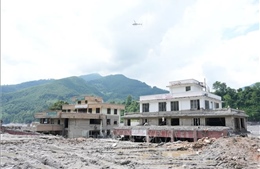 Lũ quét tại Nepal và Trung Quốc: Nỗ lực xác minh danh tính và những lễ tang tượng trưng