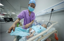 Quốc hội Trung Quốc thảo luận dự thảo sửa đổi cho phép sinh con thứ ba