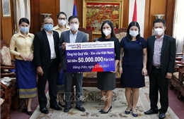 Cộng đồng người Việt tại Lào tiếp tục ủng hộ chống dịch COVID-19 tại quê nhà