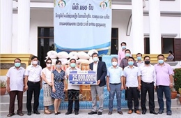 Cộng đồng người Việt tại Lào góp sức cùng chính quyền sở tại phòng chống dịch