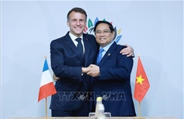 Thủ tướng Phạm Minh Chính gặp Tổng thống Pháp và Tổng Thư ký OECD nhân Hội nghị G20