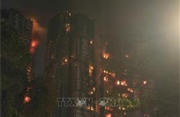 Hong Kong (Trung Quốc) nâng cảnh báo vụ cháy chung cư lên mức cao nhất