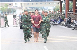 Công an Việt Nam bàn giao 4 đối tượng truy nã cho Trung Quốc