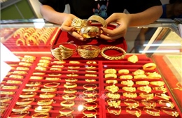 Giá vàng châu Á giảm xuống mức thấp nhất trong hơn một tuần