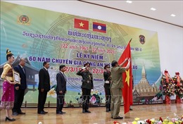 Kỷ niệm trọng thể 60 năm Ngày chuyên gia Công an Việt Nam tại Lào
