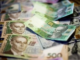 Ukraine giảm tỷ giá đồng nội tệ so với đồng USD