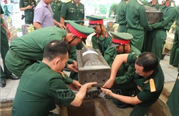 Truy điệu, an táng 8 hài cốt liệt sỹ quân tình nguyện Việt Nam hy sinh tại Lào