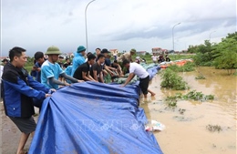 Chung sức, đồng lòng vượt qua thiên tai