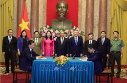 Chủ tịch nước Nguyễn Xuân Phúc dự Lễ ký Quy chế phối hợp công tác