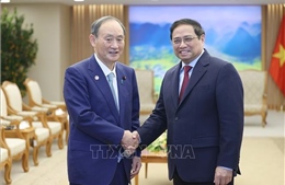 Thủ tướng Phạm Minh Chính tiếp nguyên Thủ tướng Nhật Bản Suga Yoshihide
