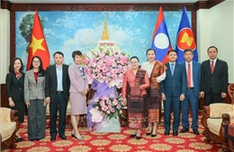 Tổng Giám đốc TTXVN chúc mừng 50 năm Quốc khánh nước CHDCND Lào