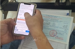 Lợi ích kép từ 'số hóa' giấy tờ đăng kiểm