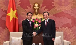 Phó Chủ tịch Quốc hội Phùng Quốc Hiển tiếp Đoàn đại biểu Quốc hội Lào