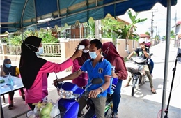 COVID-19 tại ASEAN ngày 12/7: Indonesia đứng đầu châu Á về ca tử vong; Ca mắc mới tại Lào tăng mức 3 con số