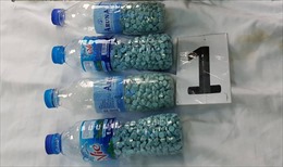 Nhét gần 2.000 viên ma túy vào chai nước suối để bán cho các nhà nghỉ, khách sạn