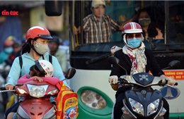 TP Hồ Chí Minh lạnh 20 độ C, người dân &#39;co ro&#39; khi ra đường
