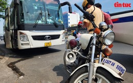 TP Hồ Chí Minh: Mở cao điểm tổng kiểm soát ô tô khách và xe container
