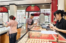 Giá vàng sáng ngày 21/5 tiếp tục hạ nhiệt, chênh lệch mua - bán vẫn neo cao