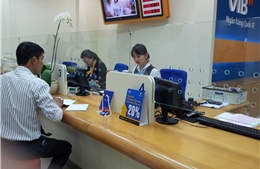Lãi suất tiền gửi xuống thấp trong khi lãi cho vay &#39;đứng yên&#39;