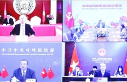 Đồng chí Lê Hoài Trung hội đàm với Trưởng Ban Liên lạc đối ngoại Trung ương Trung Quốc
