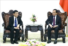 Phó Thủ tướng Chính phủ Trần Lưu Quang tiếp Bộ trưởng Bộ Nội vụ Lào Thongchanh Manixay