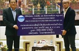 Thủ tướng Lào đánh giá cao sự hỗ trợ của doanh nghiệp Việt Nam trong công tác an sinh xã hội