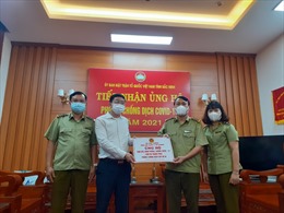 Tổng cục Quản lý thị trường ủng hộ tỉnh Bắc Ninh 1.000 bộ trang phục phòng, chống dịch