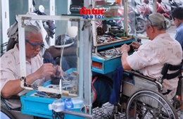 Người thợ sửa đồng hồ và ánh hào quang của nhà vô địch đua xe lăn