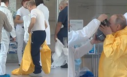 Tổng thống Putin mặc đồ bảo hộ kín người vào thăm bệnh nhân COVID-19