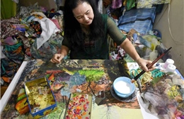 Hãng thông tấn Pháp đưa tin về nữ nghệ sĩ sáng tác tranh vải Việt Nam