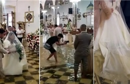 Cặp đôi Philippines quyết tâm cử hành hôn lễ dù nhà thờ ngập nước do mưa lớn