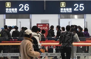 Trung Quốc áp dụng chính sách miễn thị thực cho công dân Anh và Canada