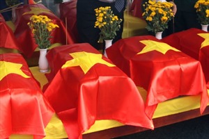 Đón hài cốt các liệt sỹ quân tình nguyện, chuyên gia Việt Nam hy sinh tại Lào