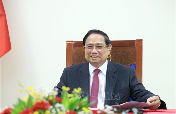 Thủ tướng Phạm Minh Chính điện đàm với Thủ tướng Singapore