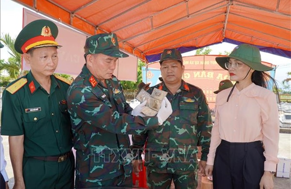 Hai bức ảnh trong phần mộ vô danh thắp hy vọng tìm lại danh tính liệt sĩ