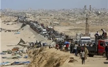 Dòng người Palestine khăn gói trở về quê nhà tan hoang ở Thành phố Gaza