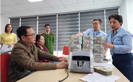 Người dân ở &#39;đất vàng&#39; ven hồ Hoàn Kiếm nhận tiền đền bù đất làm quảng trường phía Đông